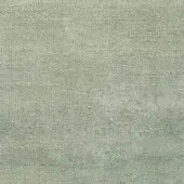 Pastel green woven fabric sample with a matte finish, displaying subtle tonal variations and a densely textured, tactile surface; label reads “bonaldo.”