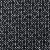 Boucle fabric sample with black and off-white geometric pattern; interlocking diamonds and crosses create a dense, textured surface.
