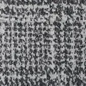 Galles fabric SA60 by Bonaldo, black and off-white woven textile with irregular, mottled pattern and subtle sheen.