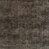 Charcoal gray woven fabric texture, “Vegas” (MB04) by Bonaldo, displays a matte, compact weave with subtle tonal variations and a distressed appearance.