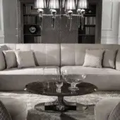 Distinguished DV Home Collection Charlotte sofa with light gray fabric upholstery and diamond-patterned quilting offering relaxed comfort