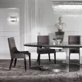 Sophisticated Byron chair by DV Home Collection with quilted grey-brown fabric upholstery and satin wood finish