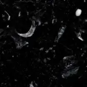 Marquinia marble sample displaying black and white granular texture with irregular, layered mineral inclusions and a natural, unpolished finish.