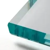 Glass block, turquoise tinted, rectangular shape with beveled edges, studio lighting, clear and textured gradient.