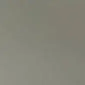Titanium gray material sample displays a smooth, uniform matte finish with consistent color and diffused neutral lighting throughout the composition.