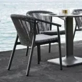Elegant Varaschin Smart armchair with a medium gray VAR#TEX mesh seat and high-end VAR#TEX synthetic rope back crafted with powder-coated aluminum