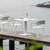 Exceptional Varaschin Plinto Bistrot table with durable aluminum base and sleek white HPL tabletop crafted for marine environments