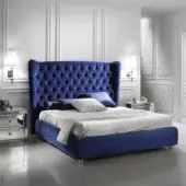 Lavish DV Home Collection Vogue bed with royal blue velvet upholstery and deeply button-tufted construction