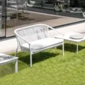 Elegant Varaschin Smart sofa with curved lines in off-white VAR#TEX and powder-coated aluminum construction