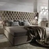 Exceptional DV Home Collection Vogue bed with plush matte fabric upholstery and a dramatically tufted headboard