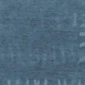 Teal fabric sample with heathered texture, dense weave, and faint geometric leaf patterns; displays “ditre italia” manufacturer text.