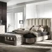 Distinguished DV Home Collection Byron bed with textured neutral beige fabric upholstery and vertically paneled headboard