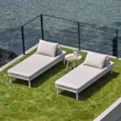 Refined Varaschin Emma lounger with matte white aluminum and light beige/gray fabric upholstery including back cushions