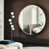 Superior Cattelan Italia Wish Magnum mirror with polished titanium-finished steel and a glossy reflective surface