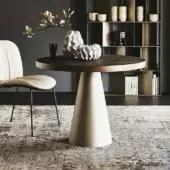 Distinguished Cattelan Italia Saturno table with medium-dark wood grain and creamy off-white embossed lacquered steel base in satin finish