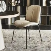 Elegant Cattelan Italia Tina chair with a titanium steel frame and neutral beige fabric upholstery featuring a curved silhouette