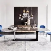 Elegant Cattelan Italia Dragon table with dark grey ceramic tabletop and matte black embossed lacquered steel base