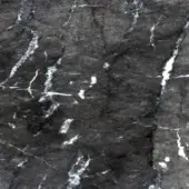 Dark gray marble texture, “ma08 grigio carnico” by Ditre Italia, features irregular white veins and a polished, mottled surface.