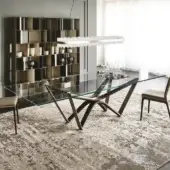 Distinguished Cattelan Italia Marathon table with sculptural base crafted in Canaletto walnut and clear glass with satin finish