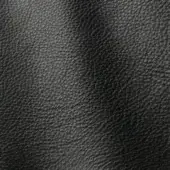 Dark gray leather texture, “Polar 207” by ditre italia, displays a consistent pebble grain with matte finish and subtle tonal variations.
