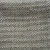 Linen fabric sample, gray-beige tone, dense square weave with stone-washed texture and visible fibers; label reads “erba lino stone washed 018”.