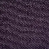 Stone-washed linen texture in dark plum displays dense, looped pile with uniform nubby pattern and subtle color variations throughout the fabric.