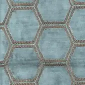 Duck egg blue woven fabric with repeating hexagon pattern outlined in bronze and beige herringbone cord, creating a textured geometric design.