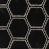 Geometric fabric sample, black hexagons with textured light beige thread outlines, dense repeating pattern, Erba brand "manipur noir" textile.