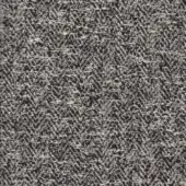 Grayscale fabric sample displaying a dense, irregular weave with dark charcoal and light gray flecks creating a speckled, textured surface.