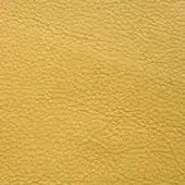 Yellow leather texture with a granular, pebbled surface and matte finish, displaying a warm, muted carioca tone and natural, tactile quality.