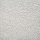White lamb leather Ascot sample, pebble-grain texture, matte finish, neutral tone, diffused lighting, erba leather collection.