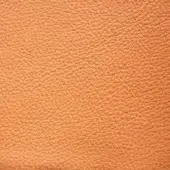 Tanned leather texture, sunset boulevard color, densely pebbled grain with subtle tonal variations and a smooth, slightly reflective finish.