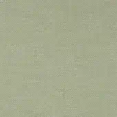 Pale green textile sample with a uniform, matte finish and repeating circular perforations creating a pixelated texture.