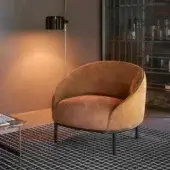 Exceptional Potocco Yoisho lounge chair in textured reddish-brown leather with burnished brass detail and slender dark metal legs
