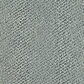 Beige fabric with a diagonal weave and dark blue speckles, exhibiting a granular looped texture; studio lighting, neutral background.