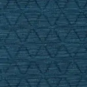 Teal quilted fabric with repeating triangle pattern, featuring tonal stitching and a subtle sheen; Lacividina “triangle hydro” textile.