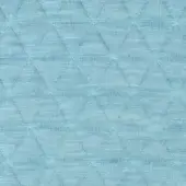Light blue quilted fabric displaying a diamond pattern of isosceles triangles, with a matte texture and subtle woven color variations.