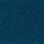 Dense teal fabric texture with short pile and granular surface, featuring scattered lighter fibers and even studio lighting.