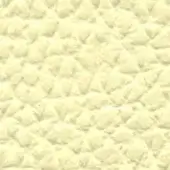 Pale yellow quilted leather texture with repeating rounded nodes and linear indentations, matte finish, honeycomb pattern, sample from Lacividina collection.