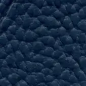 Navy blue looped leather texture sample displaying a nubby, irregular surface with varied pile height and a matte finish, labeled “lacividina leather (lux)”.