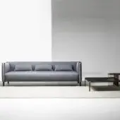 Superior LaCividina Pinch sofa with smooth matte medium gray textile and slender dark metal frame