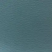 Powder blue fabric texture, “time tl15” from MDF Italia, displays a dense, pebbled surface with subtle tonal variations and a matte finish.