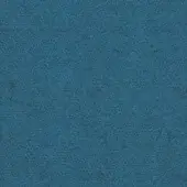 Light blue fabric swatch from MDF Italia’s Perth collection displays a dense, matte, felt-like texture with subtle tonal variations.