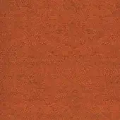 Rust fabric sample with dense fibrous texture, mottled orange-brown tone, and uneven surface from MDF Italia’s fabric collection.