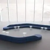 Exceptional LaCividina Guest sectional with expansive curved form and smooth matte deep blue textile upholstery