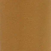 Textured fabric sample, rust beige with orange dots, displaying a mottled woven pattern and subtle depth; studio lighting.