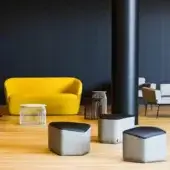 Distinguished LaCividina Modo ottoman with medium-gray textured fabric and dark smooth synthetic top surface