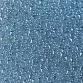 Granular light blue texture with irregular particles, white inclusions, and a matte finish, resembling azurite with a speckled, shimmering composition.