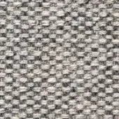 Heathered beige fabric texture with irregular weave, featuring gray threads and a nubby surface, displaying visual depth and fiber variation.