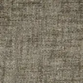 Textured olive green fabric sample displaying a granular, mottled patchwork with embedded particles and a slightly rough, uneven surface.